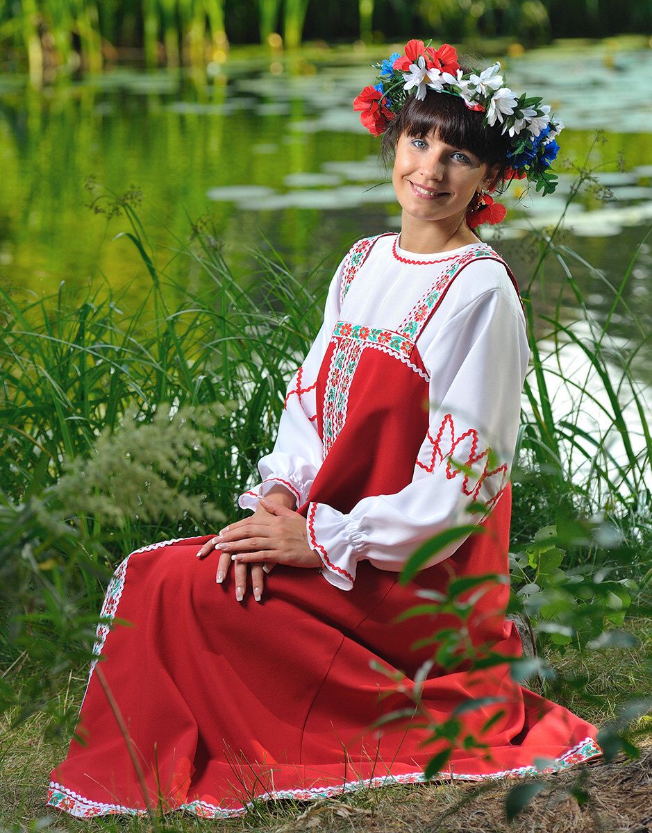 Beautiful girl Girls in Slavic costumes in Riga